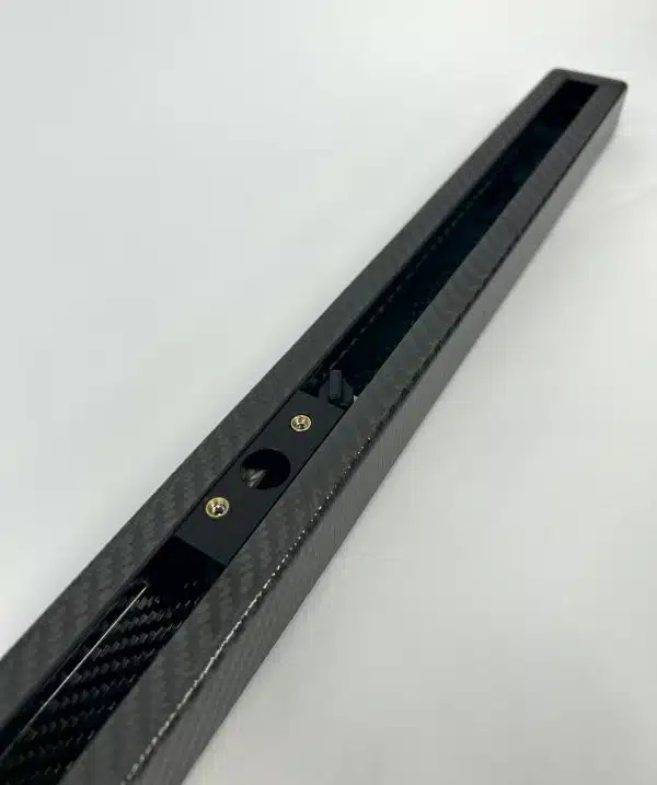 Prepreg carbon channel on Onehundred Boardz mast track, designed for RS:X, Starboard Phantom, Exocet RS V6, Unifiber, and Division II windsurfing boards.